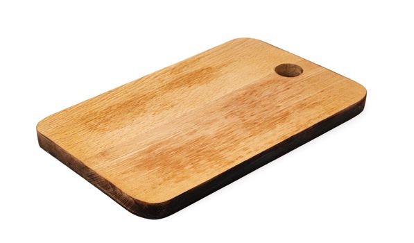 Wooden cutting board on a white background, close up