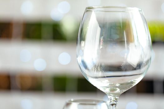 Empty wine glass on a restaurant table. Close up.