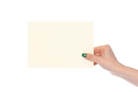 Woman's hand showing white paper banner isolated on white background