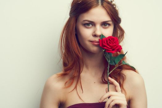 attractive woman with rose flower makeup romance model. High quality photo