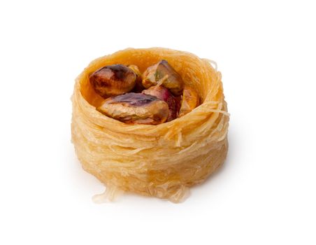 Close up photo of Turkish dessert baklava isolated on white