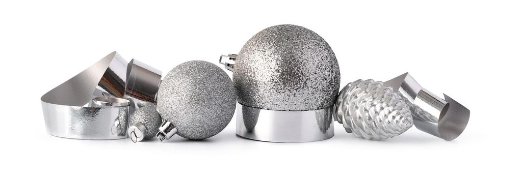 Silver sparkling Christmas baubles isolated on white background, close up