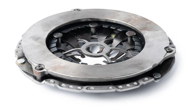 New automotive clutch on a white background. Close up.