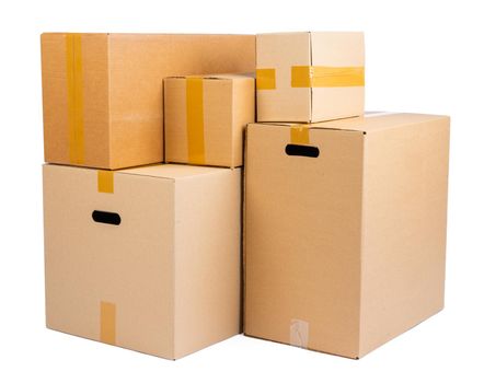 Stack of cardboard boxes isolated on white background. High quality photo