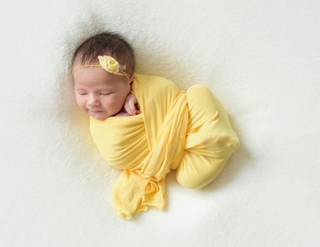Cute sleeping newborn baby girl