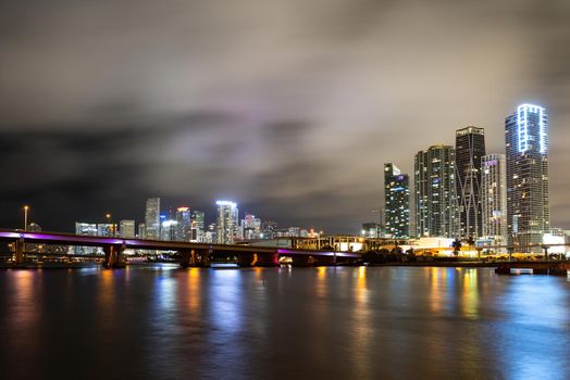 Bayside Miami Downtown MacArthur Causeway from Venetian Causeway. Miami night downtown, city Florida