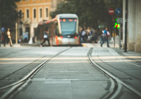 tram tracks and a tram on the street of Munich, Bavaria, Germany