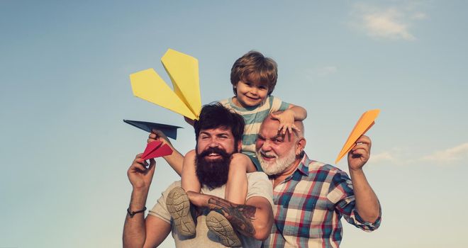 Weekend family play. Men in different ages. Happy men loving family. Father son and grandfather playing - family time together. Happy fathers day