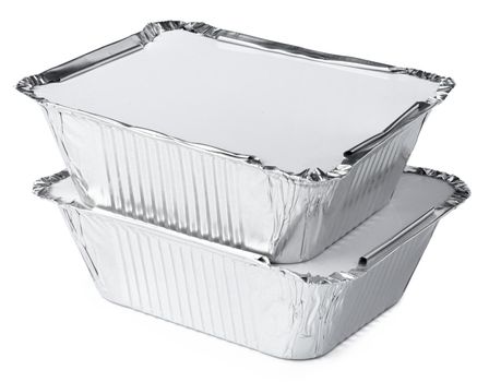 Packed foil food boxes on white background, copy space, close up