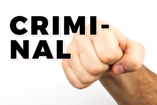 Blured Male hairy hand shows fist that symbolizes danger, crime, blow, fight isolated on white background and text 'criminal'.