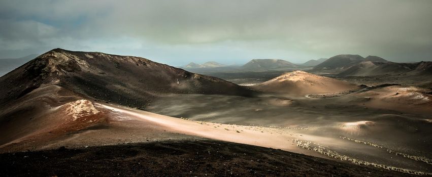 beautiful mountain landscape with volcanoes in Timanfaya National Park in Lanzarote, Canary Islands