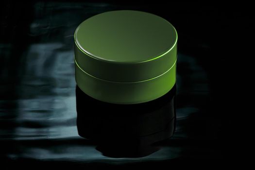Small green jar in water with reflection on a dark background. Mockup for advertising cream, lation, moisturizing milk or body and face care products