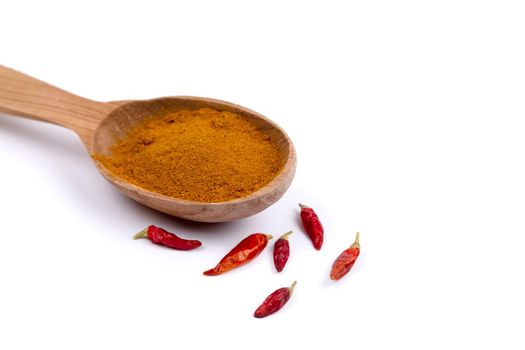 Paprika spice in wooden spoon. Picture of a Paprika spice in wooden spoon.