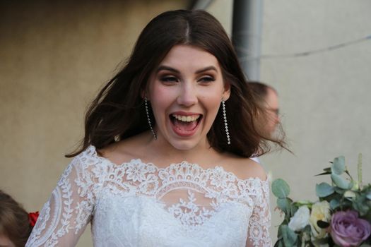 Wedding photography in rustic style emotions of the bride on the nature on the rocks