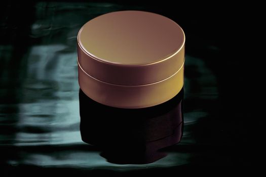 Small jar of beige color in water with reflection on a dark background. Mockup for advertising cream, lation, moisturizing milk or body and face care products