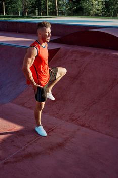 sports man doing exercises on the sports field fitness. High quality photo