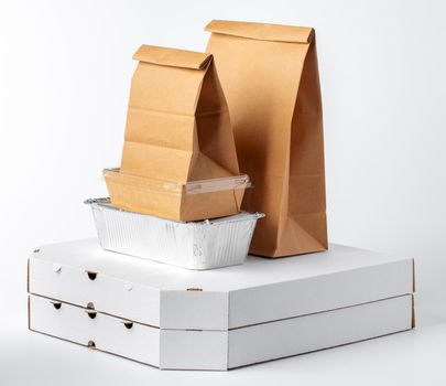 Set of recyclable food packaging on white background close up