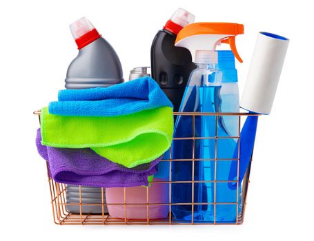 Cleaning items in basket isolated on white background, close up