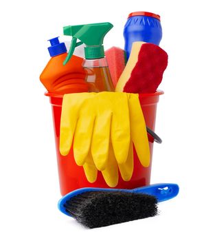 Red bucket with cleaning supplies isolated on white background, close up