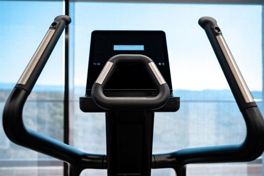 Close up photo of cardio trainer in a fitness gym