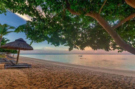 Tropical beach shortly before the sun goes down over Mauritius.