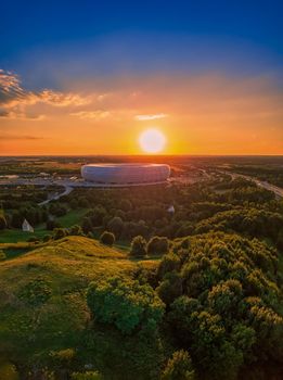 Stadium aerial, shot at a beautiful sunset by a drone.