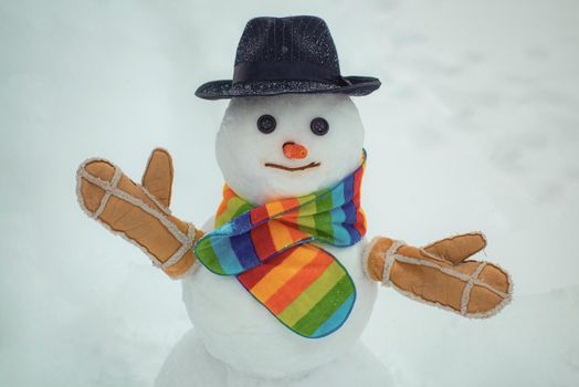 Christmas snowman on white snow background. New year concept