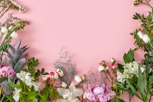 White flowers alstroemeria branches and green leaf on pastel pink background with copy space. Sweet and beautiful wallpaper for Valentine or wedding backdrop design