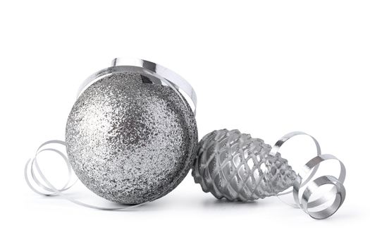 Silver sparkling Christmas baubles isolated on white background, close up