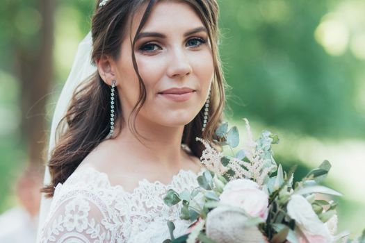 Wedding photography in rustic style emotions of the bride on the nature on the rocks