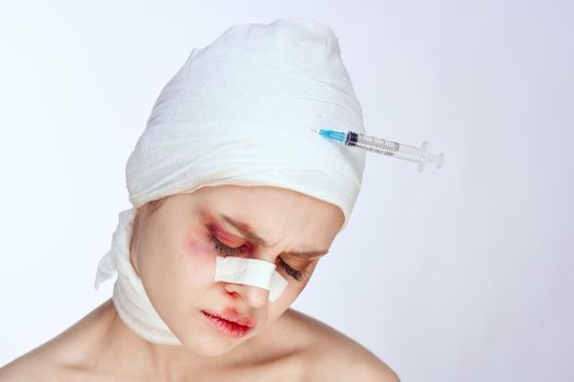 female patient bruised face medicine treatment injury isolated background. High quality photo