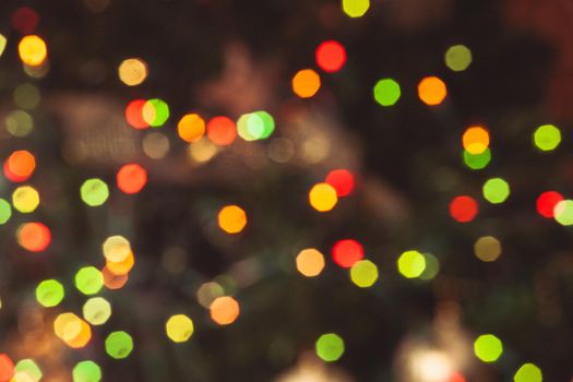 Defocused Christmas tree lights as a holiday background