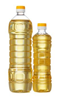 Set of sunflower oil in plastic bottle isolated on white background, close up.