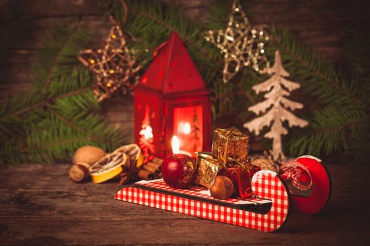 Decorative boxes and nuts on the sledges. Symbols of Christmas holiday