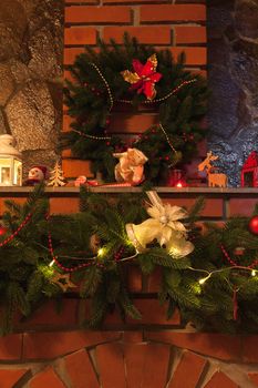Christmas wreath and garland on the fireplace