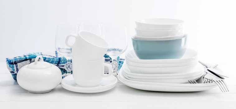 White square dinnerware set. Piece dinnerware set with glasses