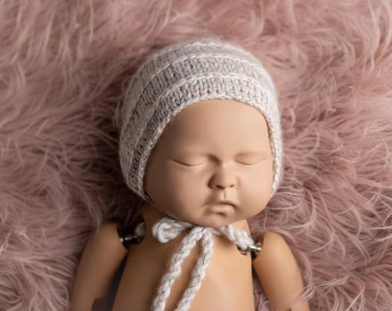 Cute toy of newborn baby for photo practice,