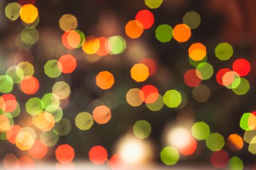 Defocused Christmas tree lights as a holiday background