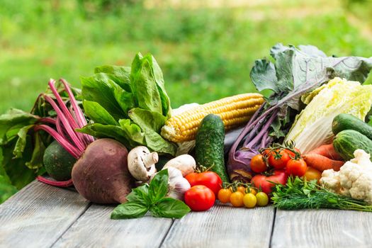 Various vegetables on a wooden table with copy space