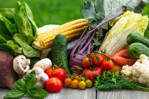 Various vegetables on a wooden table with copy space