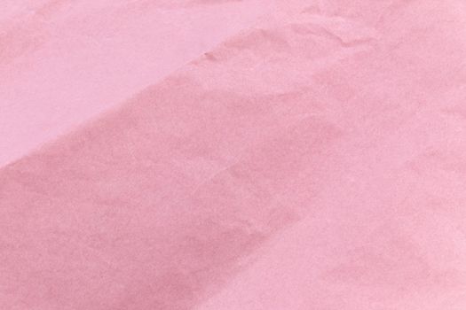 Texture of pink craft crumpled paper background.