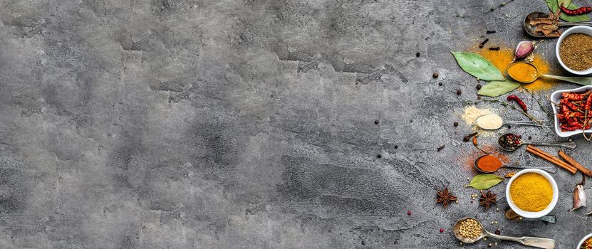 spices on a gray concrete background with place for text. view from above