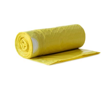 roll of yellow garbage bags isolated on white background