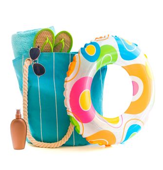 bag with beach accessories isolated on a white background