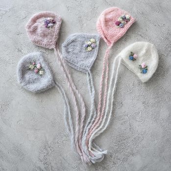 set of tender knitted hats for newborn. props for photo sessions