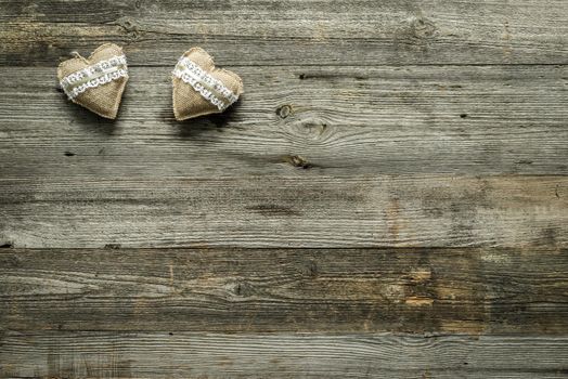 two hearts on old wooden background, beautiful card for valentine day