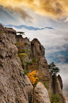 Beautiful view of rocks against the valley at sunset