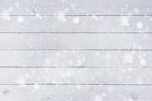 white wooden planks under the snow like a beautiful christmas background