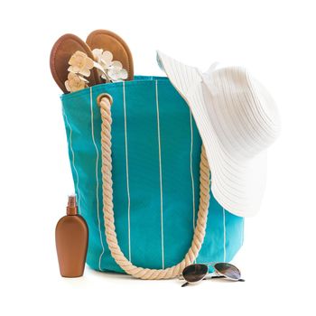 bag with beach accessories isolated on a white background