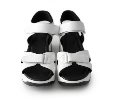 nice white children sandals with black inside isolated on white background